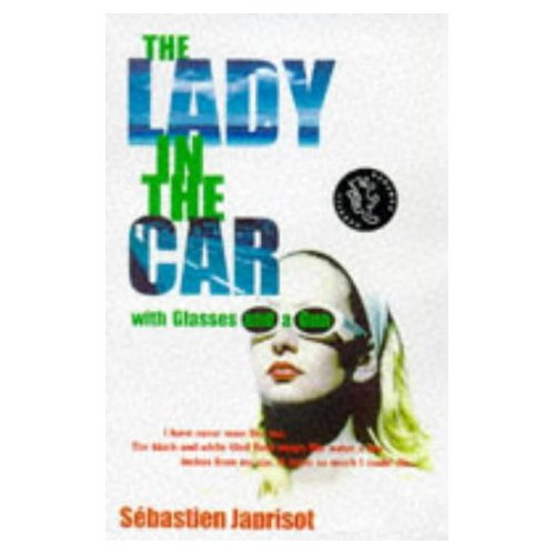 LADY IN THE CAR WITH GLASSES AND A GUN DAME DNS L'AUTO AVEC DES LUNETTES ET UN FUSIL