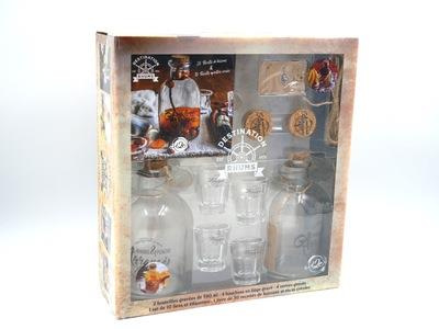 Destinations rhums. Coffret avec 2 bouteilles de 590 ml, 4 bouchons en liège gravé, 4 verres gravés,