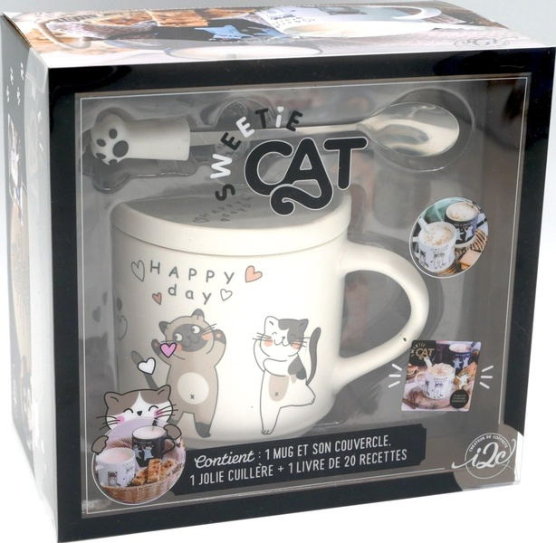 Coffret Sweetie cat. Contient : 1 mug et son couvercle, 1 jolie cuillère et 1 livre e 20 recettes