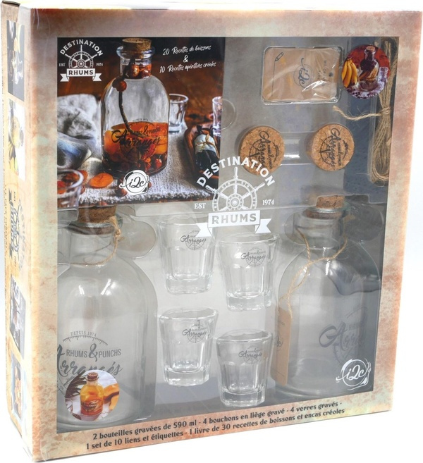 Destination rhums. Coffret avec 2 bouteilles, 4 verres, 1 set d'étiquettes, 1 livre de recettes et 1