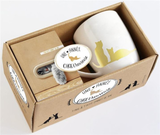 Une année chat'lheureuse. Contient 1 mug et 1 petit carnet de sac