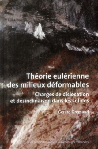 Théorie eulérienne des milieux déformables. Charges de dislocation et désinclinaison dans les solide